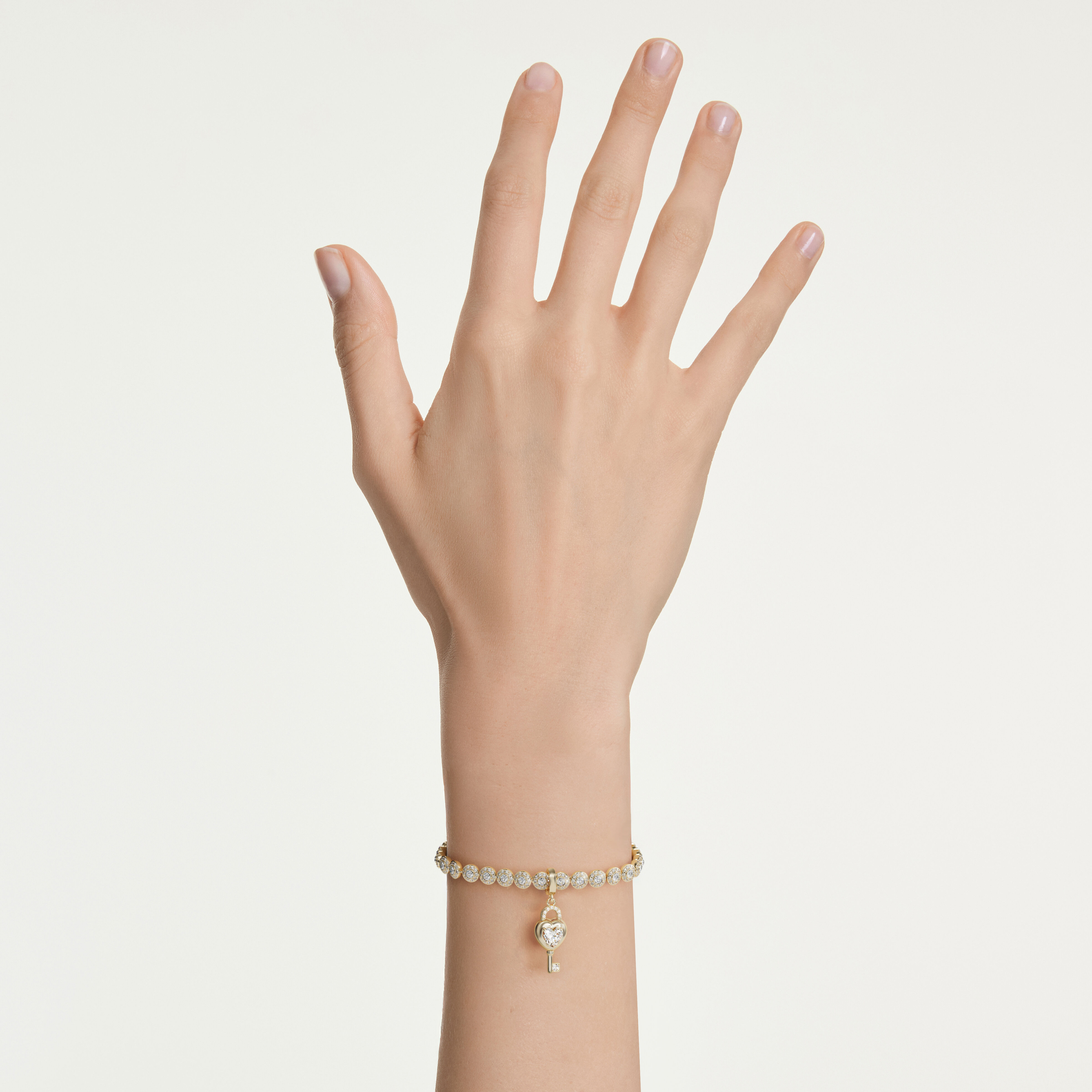 swarovski حلية idyllia، قطع متنوع، شكل قلب ومفتاح، لون أبيض، طلاء باللون الذهبي