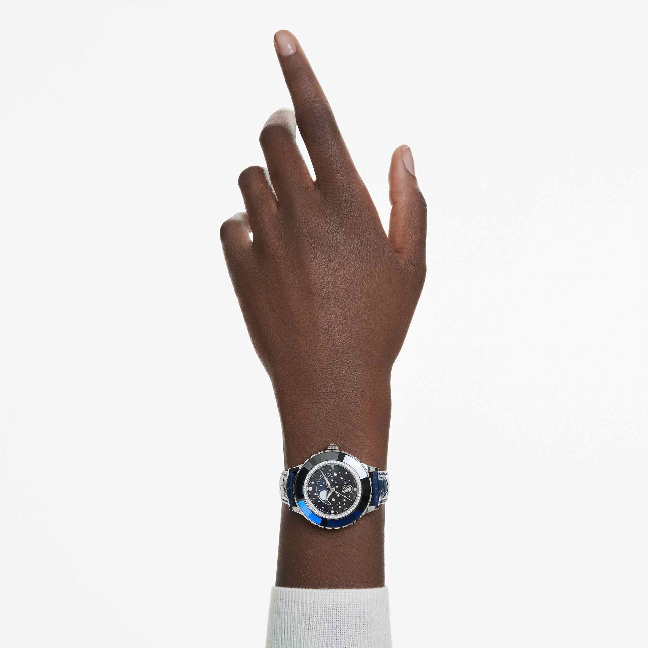 swarovski ساعة octea moon، صناعة سويسرية، شكل قمر، سوار جلد، لون أزرق، ستانلس ستيل