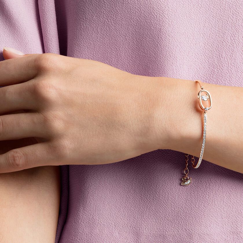 swarovski سوار una، قطع مستدير، على شكل بيضاوي، لون أبيض، طلاء ذهبي وردي