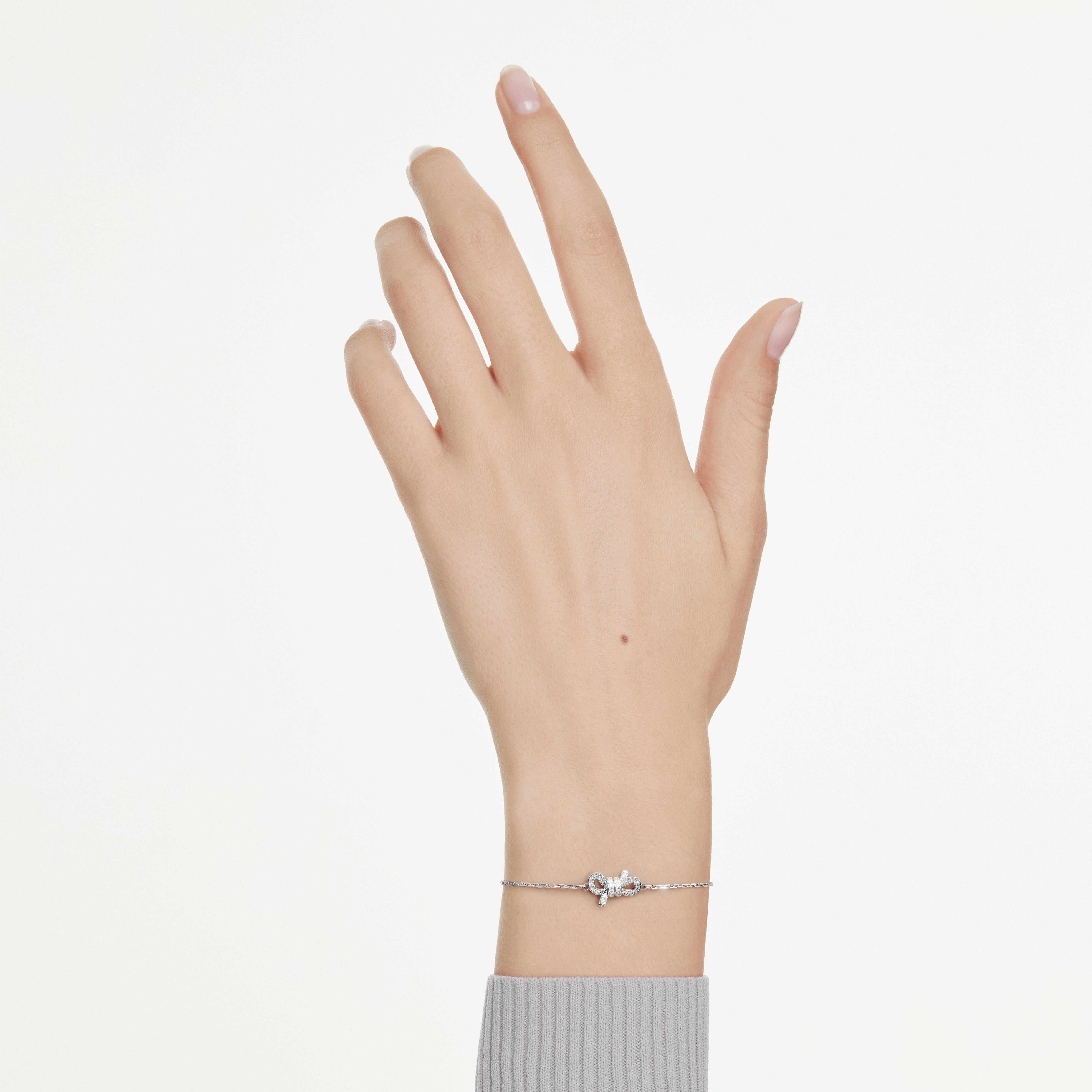 swarovski سوار lifelong، أحجار كريستال صغيرة متراصة، شكل أنشوطة، لون أبيض، طلاء روديوم