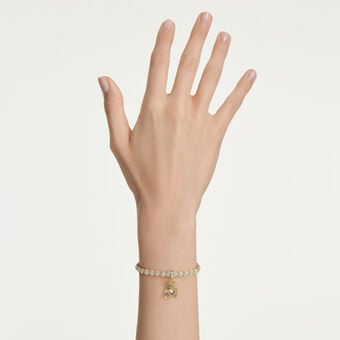 swarovski حلية idyllia، قطع متنوع، شكل دب، لون ذهبي، طلاء باللون الذهبي